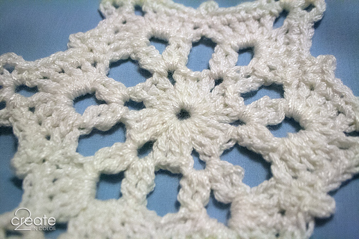 Six sections, people! Six sections to a snowflake. This one shows a little awkwardness since it is the first time through with this pattern.